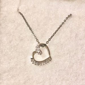 Heart pendent necklace with diamonds